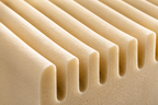 Close-up illustration of E-Gel latex with deep ribbed channels.