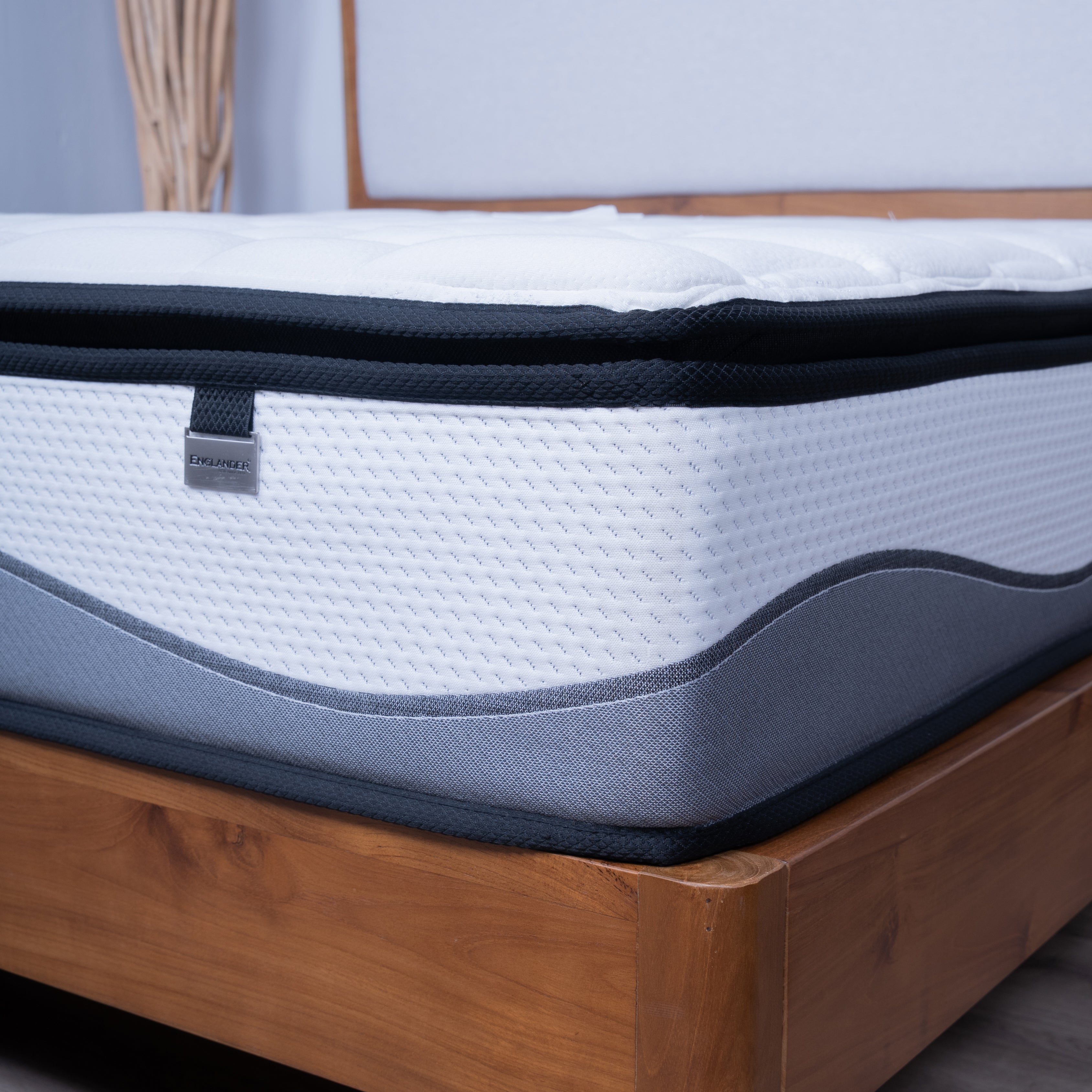Englanders Resort Refresh Mattress on a wooden bed frame