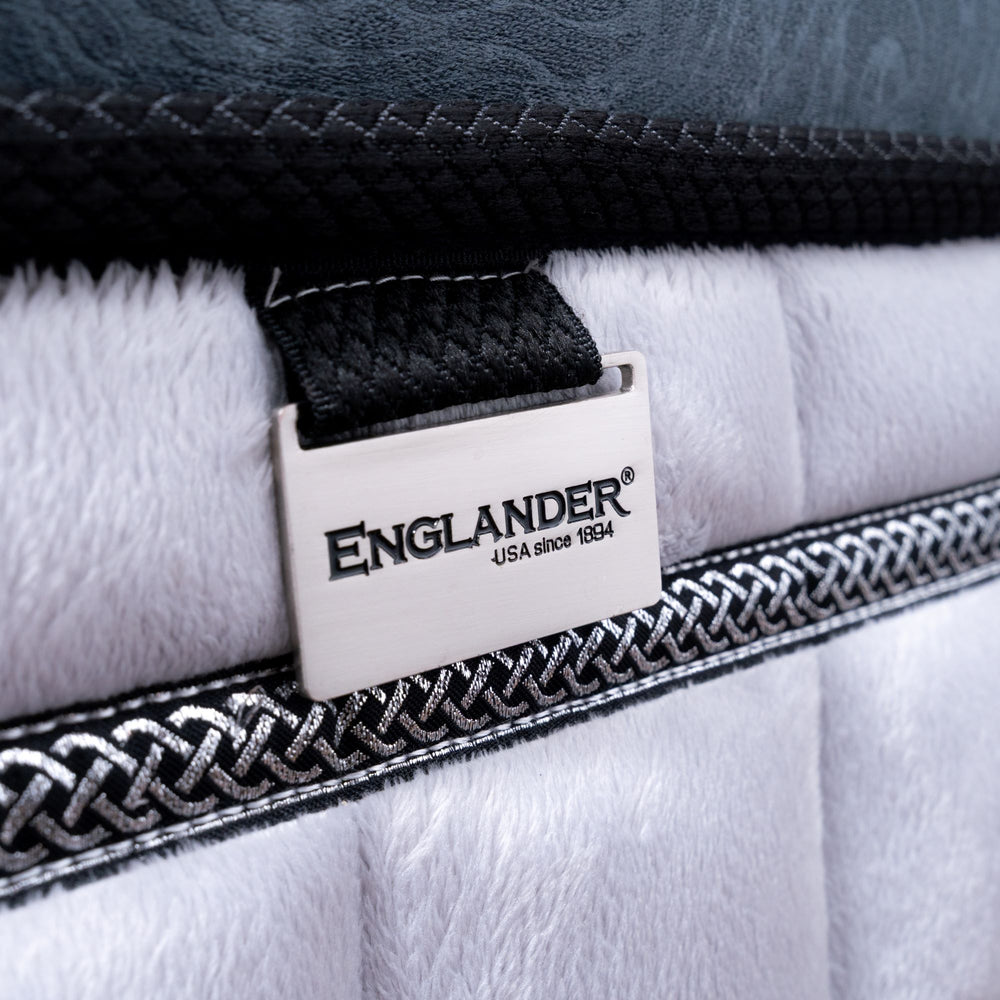 Close-up of Englander branded label on Hotel presidential mattress with visible stitching details.