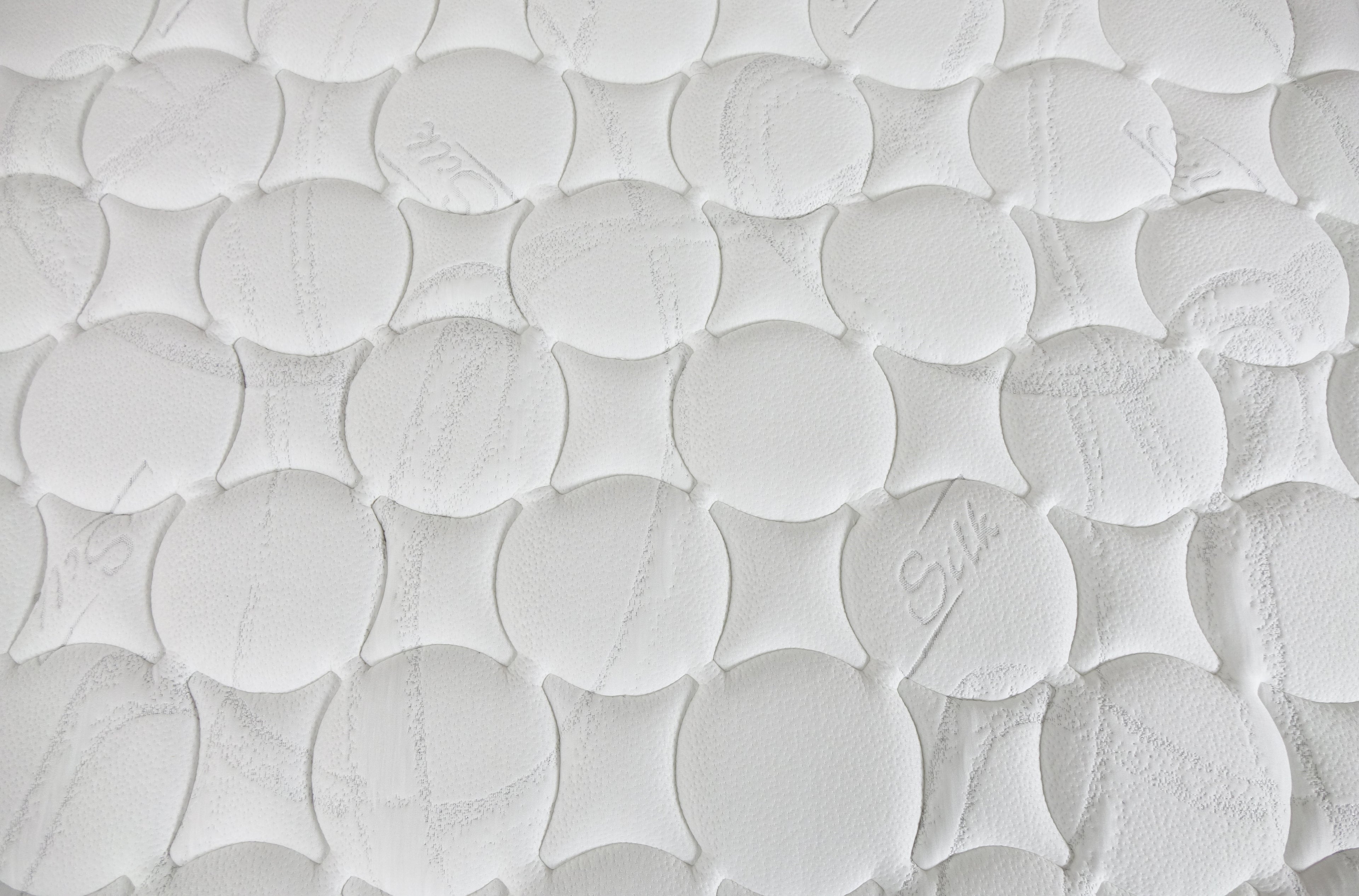 Close up of  Englanders Hotel 1984 Mattress Surface with writing silk on the surface